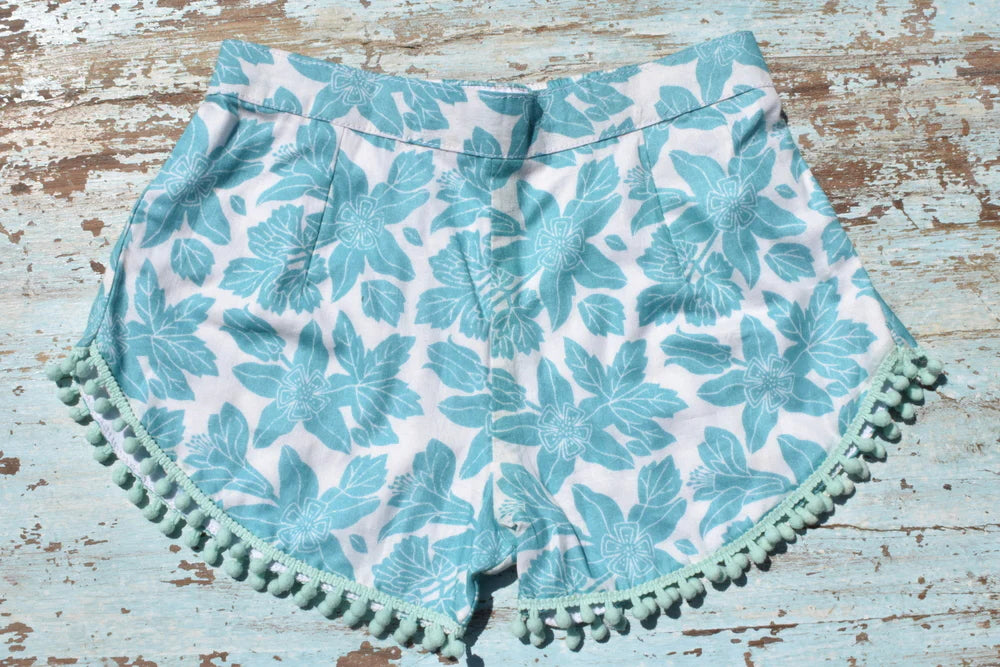 COASTIE SHORTS - Turquoise White Flower Green Bobble