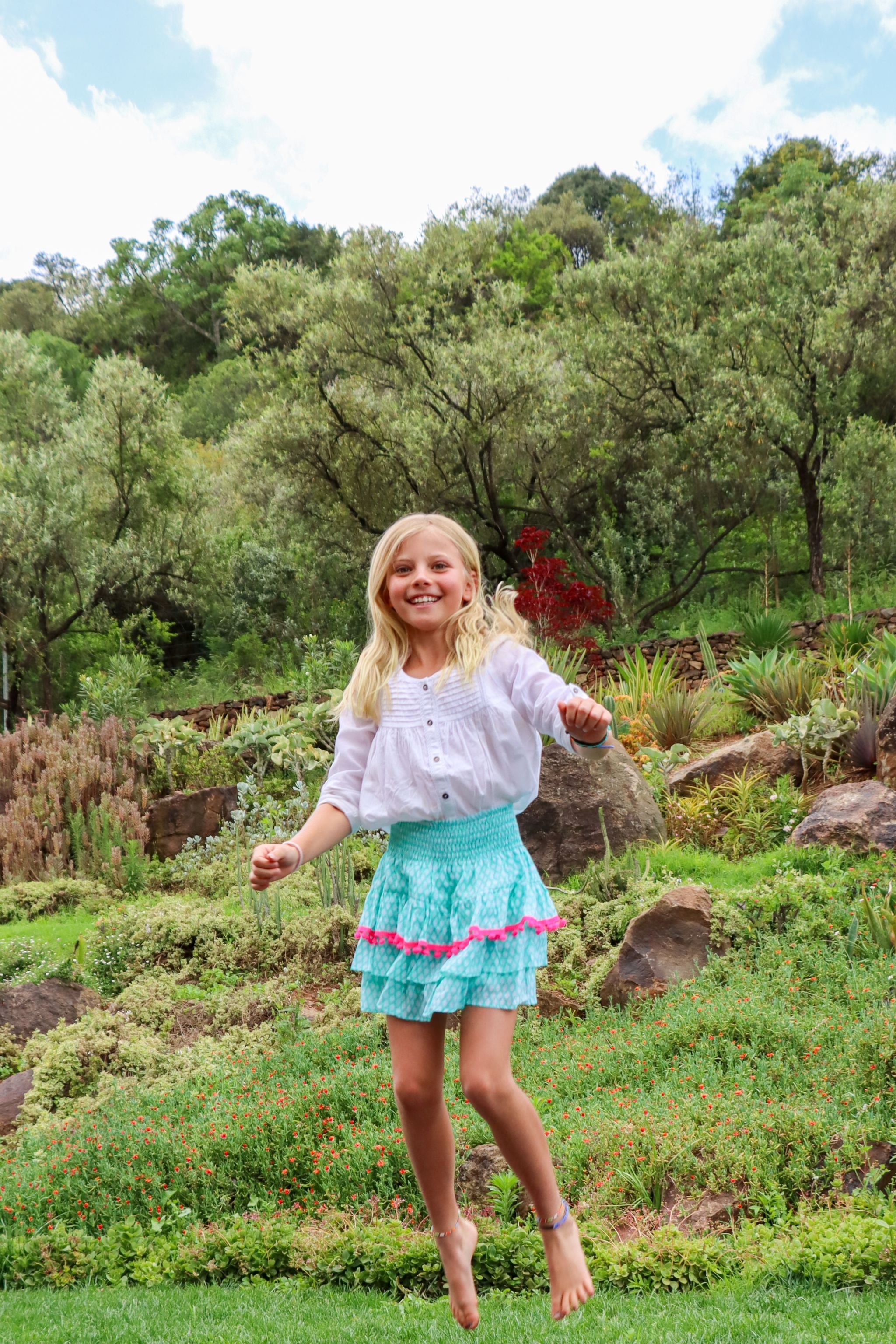 Rara Skort - green fir cone with pink pompoms