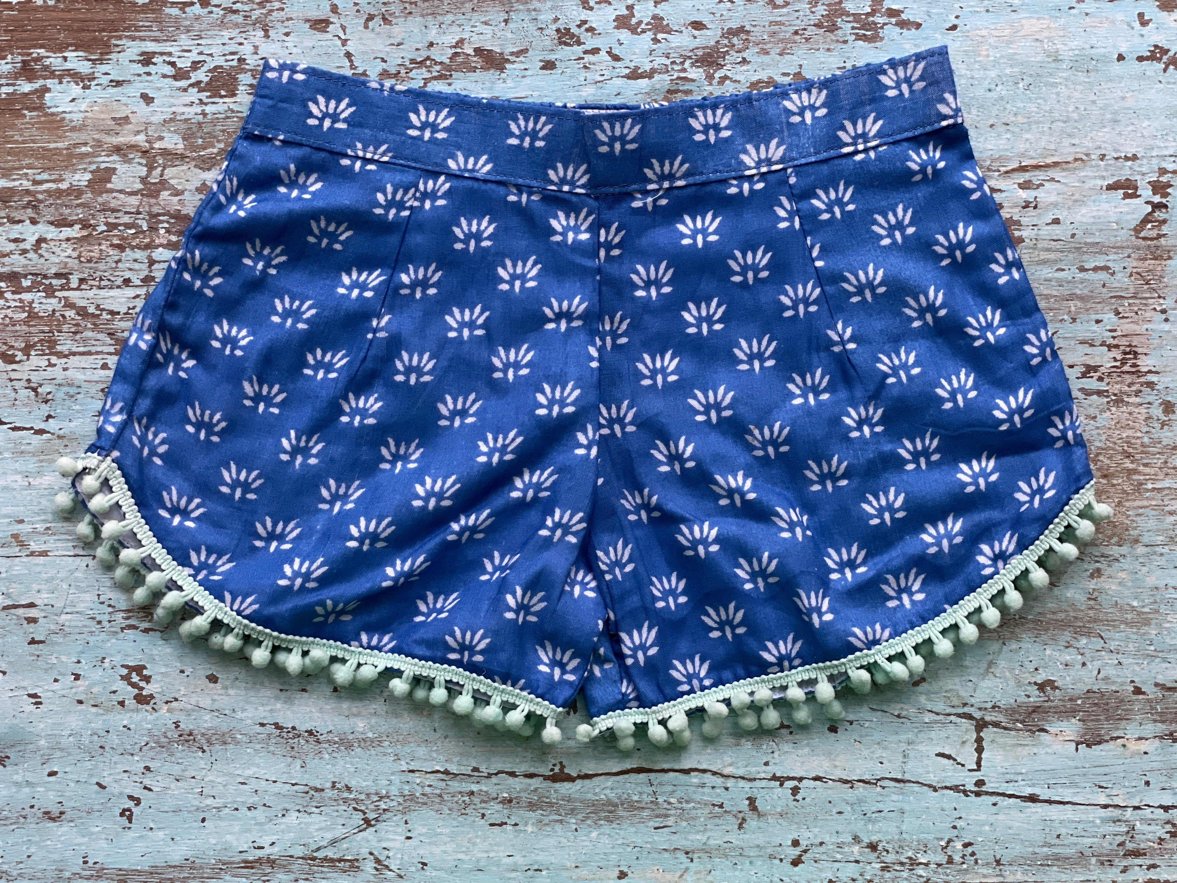 COASTIE SHORTS - Dark Blue Flower Teal Bobble