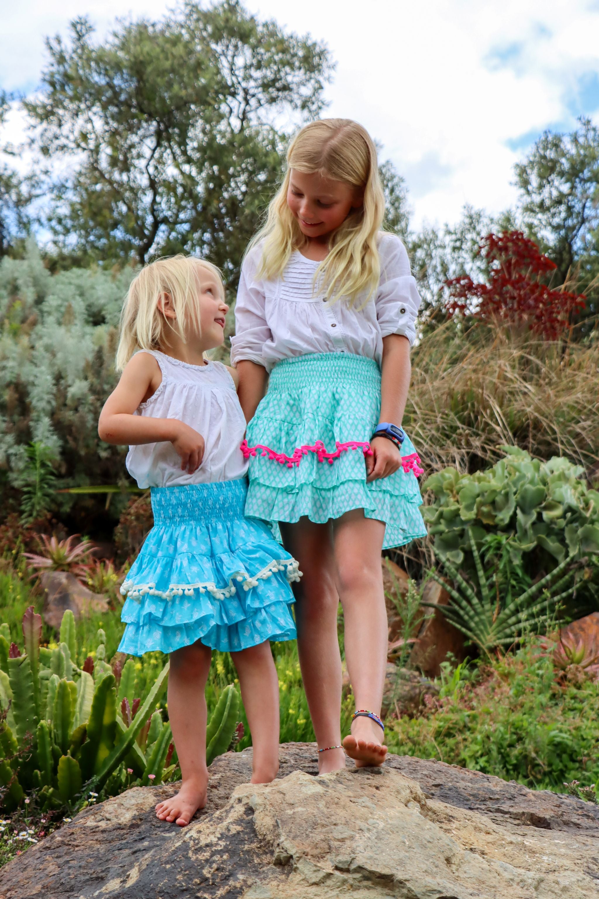 Rara Skort -  green fir cone with pink pompoms