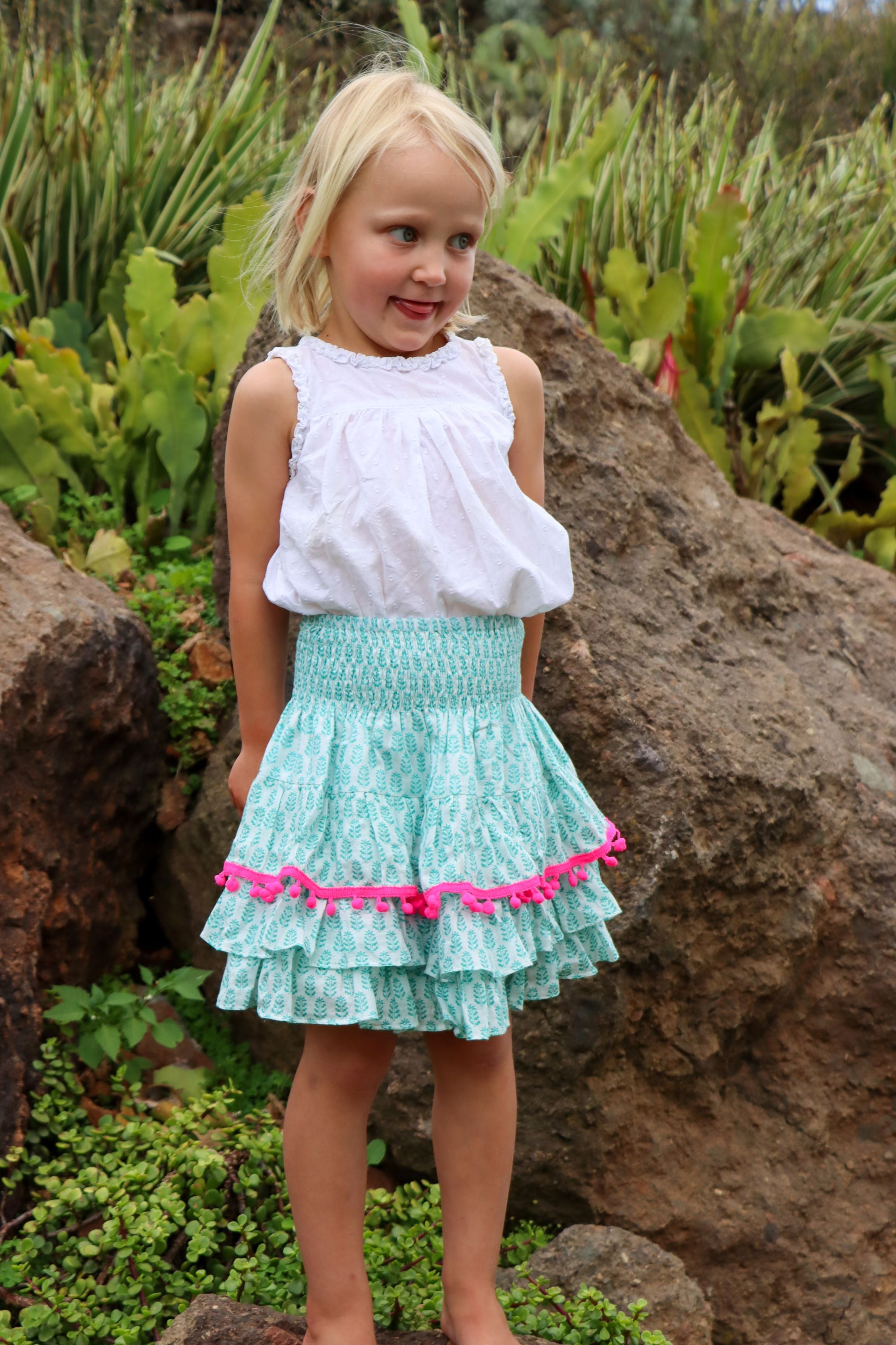 Rara Skort - green fern with neon pink pompoms