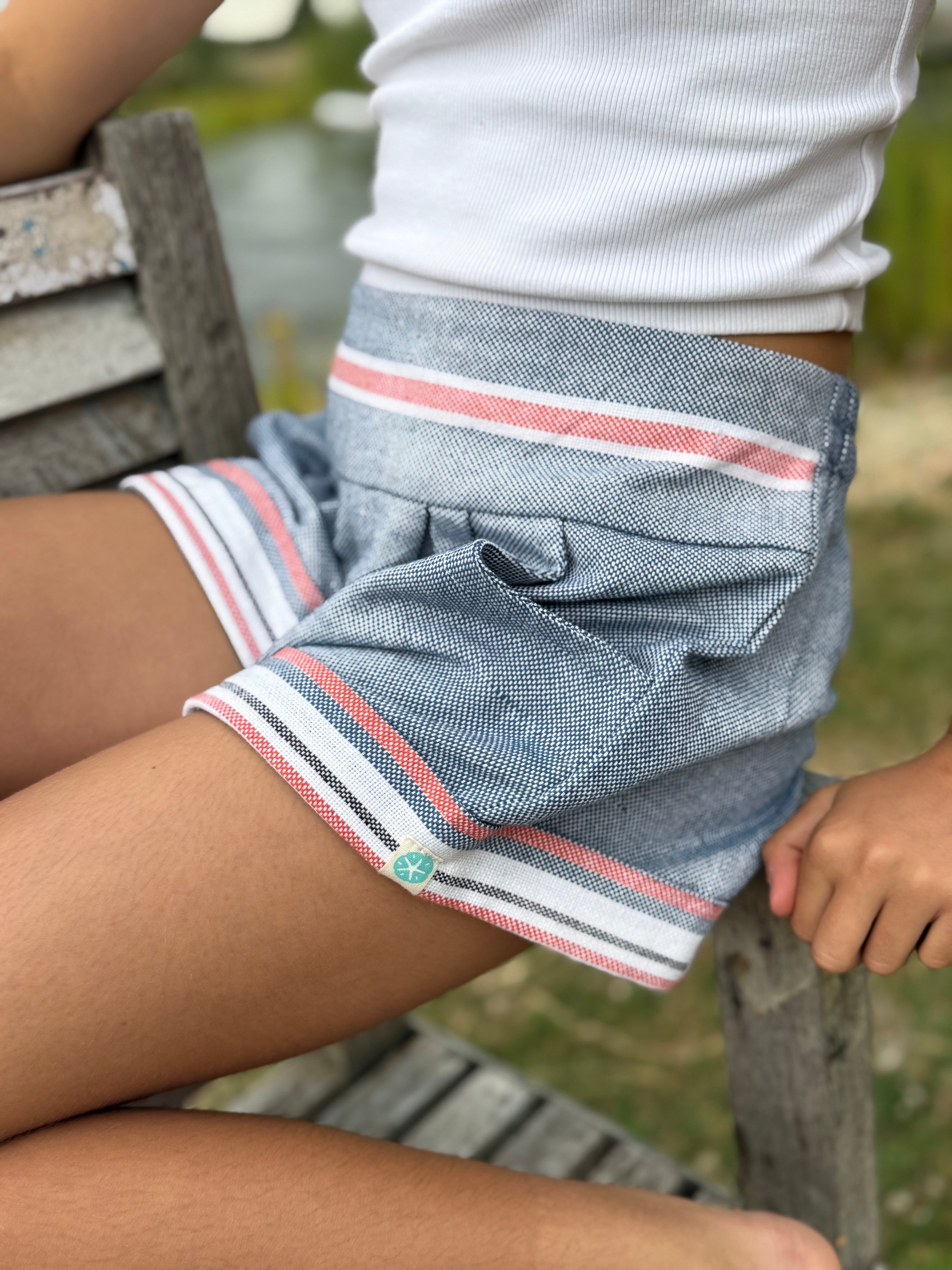 Girls Kikoy Flat Front shorts - Navy Red Stripe